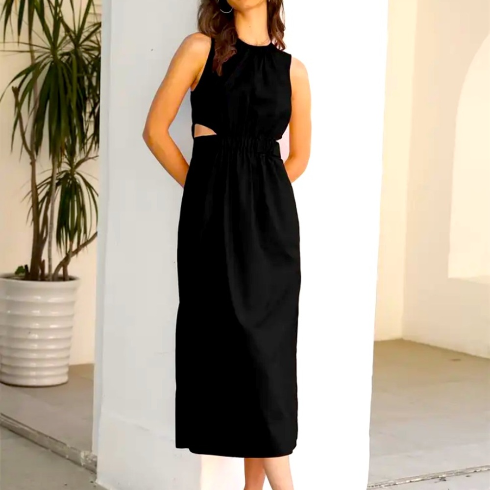 Super cute black dress with cut outs. Size 14.